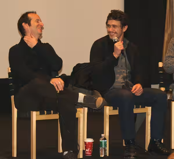 Denis O'Hare and James Franco discussing the film Milk about Harvey Milk. Photographer's blog post about the event in the photo. (2008)