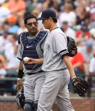 New York Yankees Chien-Ming Wang talks with catcher Jose Molino after giving up a run against the Baltimore Orioles, Sunday July 29, 2007 at Camden Yards in Bal