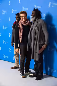Jacob Junior Nayinggul, Simon Baker and Witiyana Marika presenting the movie High Ground at the Berlinale 2020