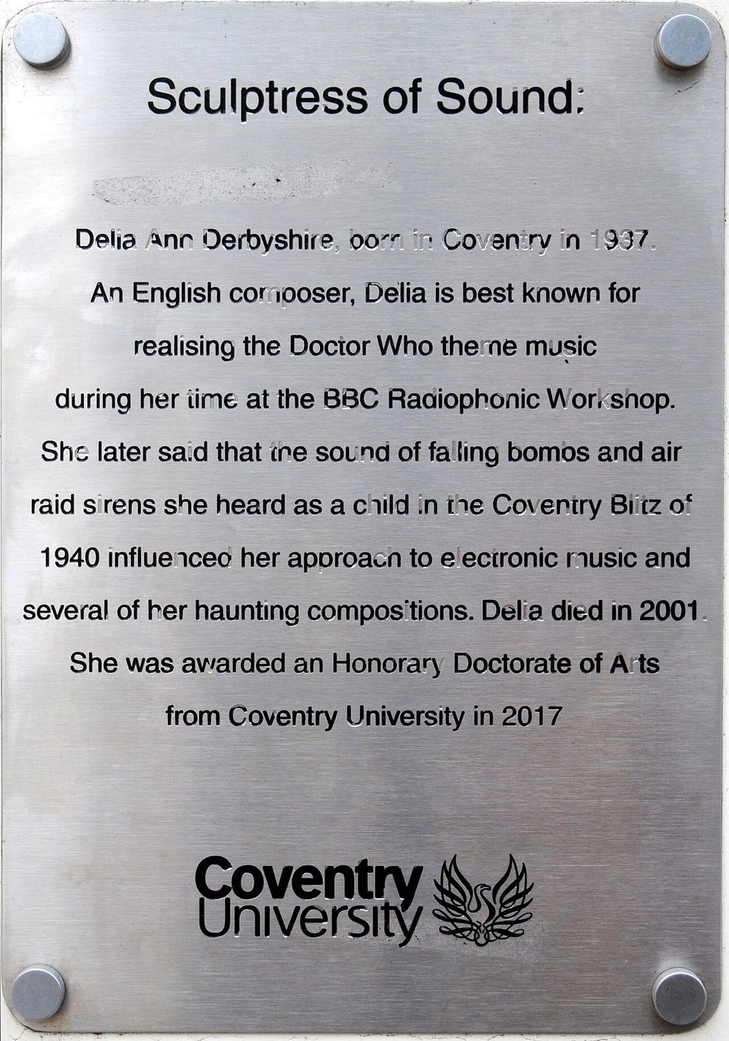 Plaque commemorating Delia Derbyshire, on the Ellen Terry building at Coventry University, England. (2019)