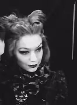 Bella Hadid and Gigi Hadid pose for cameras backstage at the Anna Sui Fall Winter 2017 show at New York Fashion Week, Skylight Clarkston Square, February 15, 20