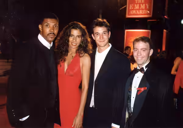 Cast members from E.R. - Eriq La Salle (left) and Noah Wyle (3rd from left), with Angela Johnson and Eric Van Danen after the 1995 Emmy Awards telecast - Septem