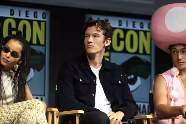 Callum Turner speaking at the 2018 San Diego Comic Con International, for "Fantastic Beasts: The Crimes of Grindelwald", at the San Diego Convention Center in S