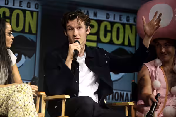 Callum Turner speaking at the 2018 San Diego Comic Con International, for "Fantastic Beasts: The Crimes of Grindelwald", at the San Diego Convention Center in S