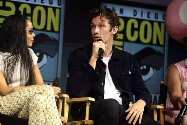 Callum Turner speaking at the 2018 San Diego Comic Con International, for "Fantastic Beasts: The Crimes of Grindelwald", at the San Diego Convention Center in S