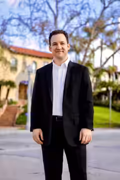 American actor and Congressional candidate Ben Savage standing on a street in the 30th Congressional District of California. The photo captures the subject stan (2023)