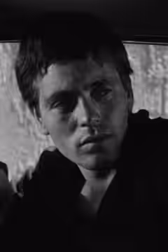 Franco Citti, close up. Screenshot from Accattone by Pier Paolo Pasolini, Rome, Italy, 1961 (1960)