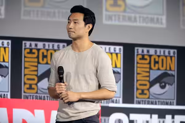 Simu Liu speaking at the 2019 San Diego Comic Con International, for "Shang-Chi and the Legend of the Ten Rings", at the San Diego Convention Center in San Dieg