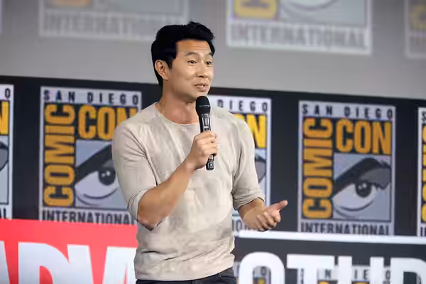 Simu Liu speaking at the 2019 San Diego Comic Con International, for "Shang-Chi and the Legend of the Ten Rings", at the San Diego Convention Center in San Dieg