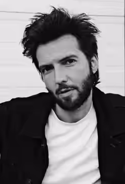 Portrait of British actor Guy Burnet taken in 2025 by photographer Maxine Clement.