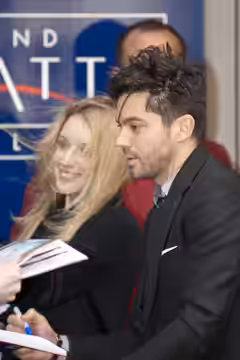 English actor Dominic Cooper and french actress Ludivine Sagnier arriving at the press conference of their movie The Devil's Double at the Berlin Film Festival  (2011)