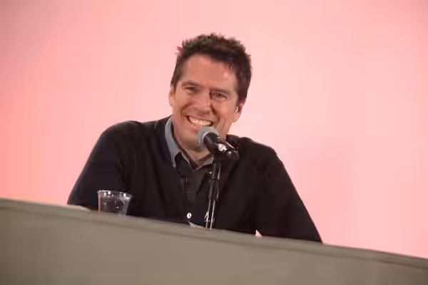 Alexis Denisof speaking at the 2015 Phoenix Comicon at the Phoenix Convention Center in Phoenix, Arizona. Please attribute to Gage Skidmore if used elsewhere.
