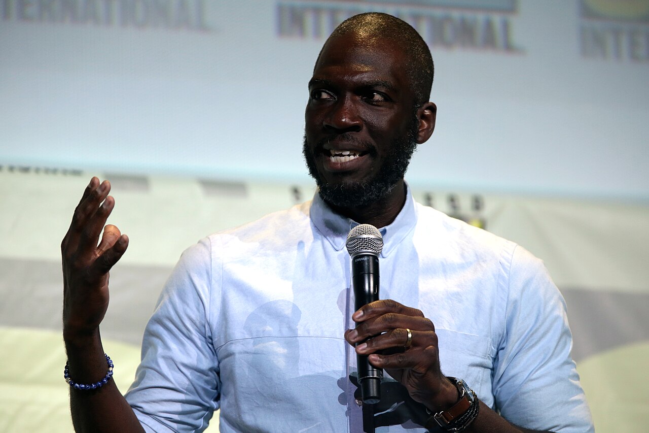 Rick Famuyiwa speaking at the 2016 San Diego Comic Con International, for "Warner Bros. Pictures", at the San Diego Convention Center in San Diego, California. 