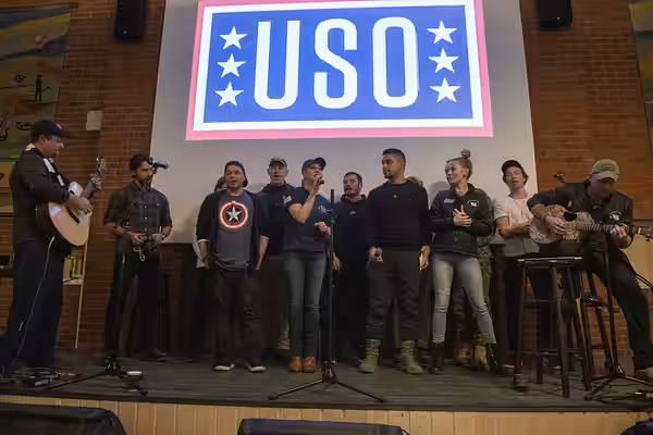 USO entertainers perform for deployed service members during the Chairman's USO Holiday Tour in Vaernes, Norway, Dec. 21, 2018. Dunford, along with USO entertai