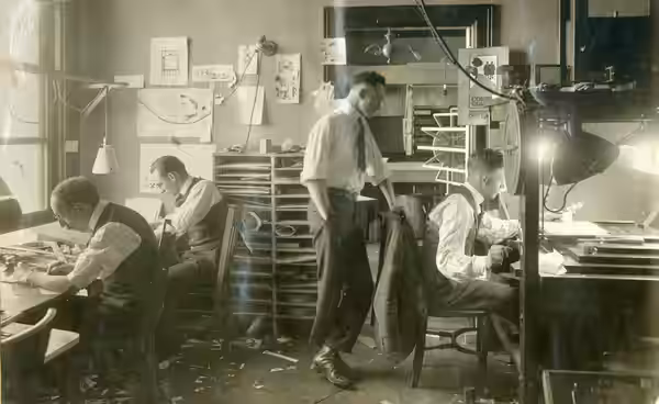 Photograph of the Animated Film Corporation, ca. 1916, San Francisco. From left: Angel Espoy, Tack Knight, Pinto Colvig (standing), Byington Ford.
