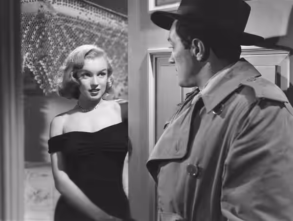 Photo of Marilyn Monroe in the Asphalt Jungle from the May 1961 issue of TV-Radio Mirror. Note this is a larger, better quality copy of the photo seen on Radio-