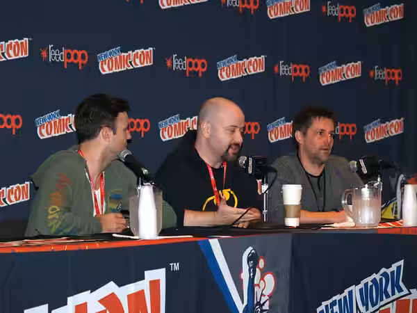 Left to right: actor/comedian Taran Killam, writer Marc Andreyko, and IDW Publishing Chief Creative Officer and Editor-in-Chief Chris Ryall, speaking on a panel (2013)