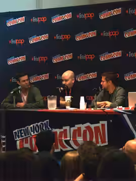 Left to right: actor/comedian Taran Killam, writer Marc Andreyko, and IDW Publishing Chief Creative Officer and Editor-in-Chief Chris Ryall, speaking on a panel (2013)
