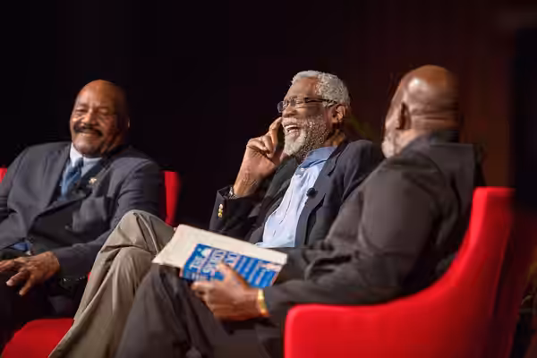 Jim Brown, Hall of Fame running back for the NFL’s Cleveland Browns, Bill Russell, Hall of Fame center for the NBA’s Boston Celtics, and moderator Harry Edwards (2014)