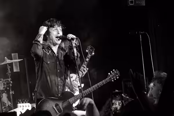 Armstrong performing with the band The Longshot in 2018.