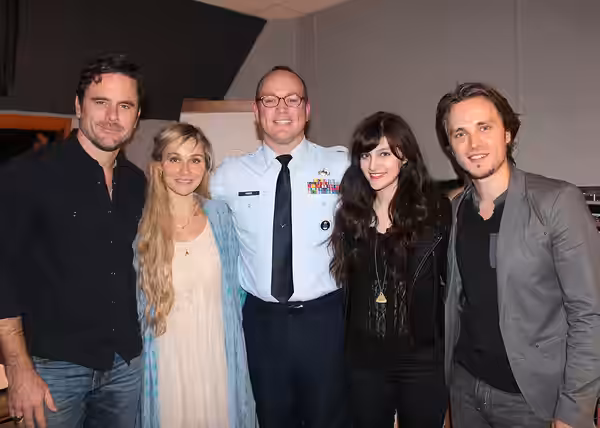 Master Sgt. Harry Kibbe is joined by TV’s Nashville cast members, from left, Charles “Chip” Esten, Clare Bowen, Aubrey Peeples and Jonathan Jackson for the 2014