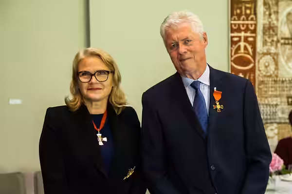 Roger Donaldson (right), after his investiture as ONZM, for services to film, by the administrator of the government, Dame Helen Winkelmann, at Government House (2023)