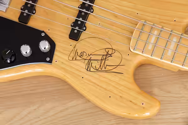 Fender Marcus Miller Jazz Bass autographed by Marcus Miller. Serial no. Q074671 Made in Japan Features: Natural finish (clear lacquer) Maple fingerboard with wh (2013)