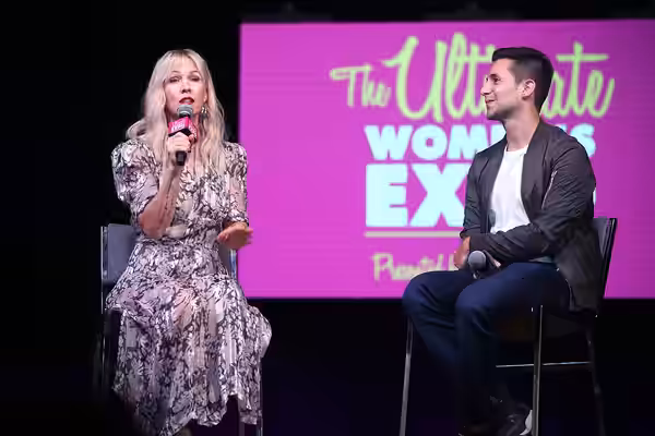Jennie Garth and Nick Ciletti speaking with attendees at the 2023 Arizona Ultimate Women's Expo at the Phoenix Convention Center in Phoenix, Arizona. Please att