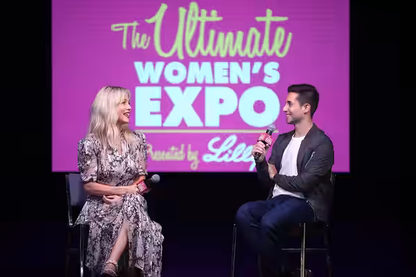 Jennie Garth and Nick Ciletti speaking with attendees at the 2023 Arizona Ultimate Women's Expo at the Phoenix Convention Center in Phoenix, Arizona. Please att