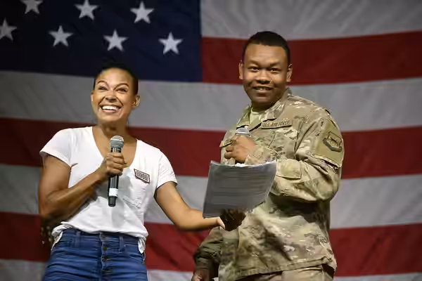 Toni Trucks performs a skit with a troop during a USO performance, Undisclosed Location, July 5, 2019. Air Force Gen. Joseph Lengyel, chief of the National Guar