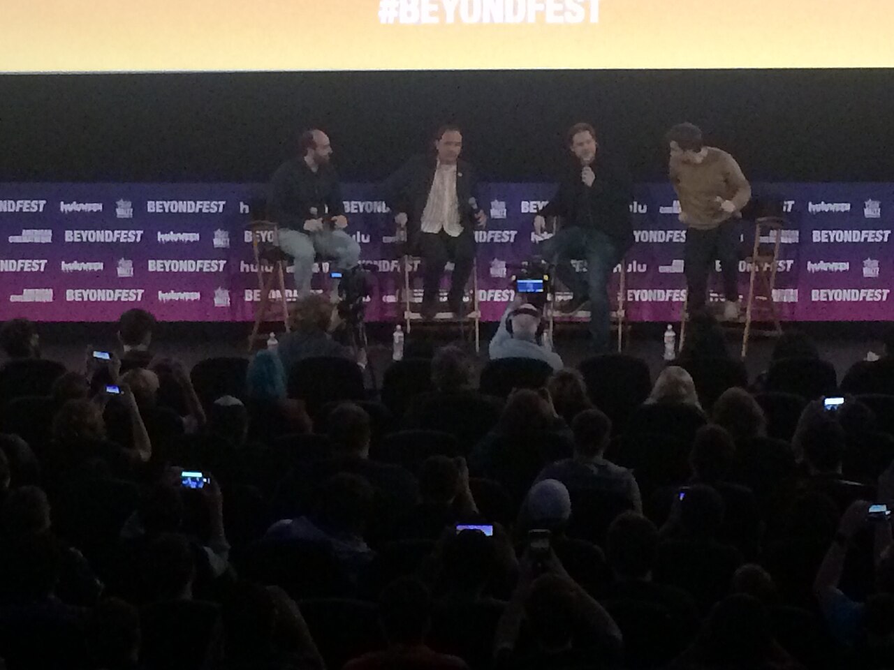 Nathan Fielder welcoming Tim Heidecker, Eric Notarnicola, and Gregg Turkington at the Mister America panel. (2019)
