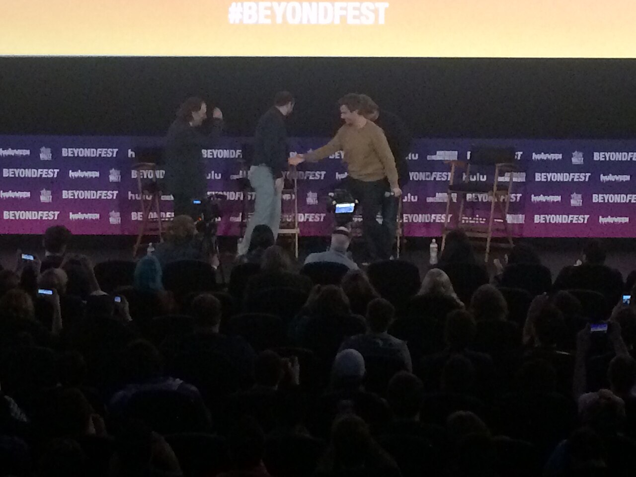 Nathan Fielder welcoming Tim Heidecker, Eric Notarnicola, and Gregg Turkington at the Mister America panel. (2019)