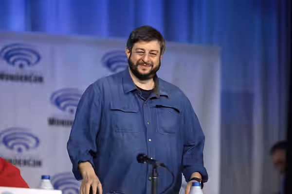 Eugene Mirman speaking at the 2022 WonderCon, for "The Bob's Burgers Movie", at the Anaheim Convention Center in Anaheim, California. Please attribute to Gage S