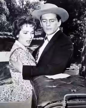 Photo of Jack Kelly as Bart Maverick and Julie Adams from the television program Maverick.