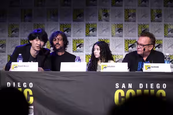 Brian A. Metcalf, Thomas Ian Nicholas, Kelly Arjen and Tom Arnold speaking at the 2023 San Diego Comic Con International, for "Underdeveloped", at the San Diego