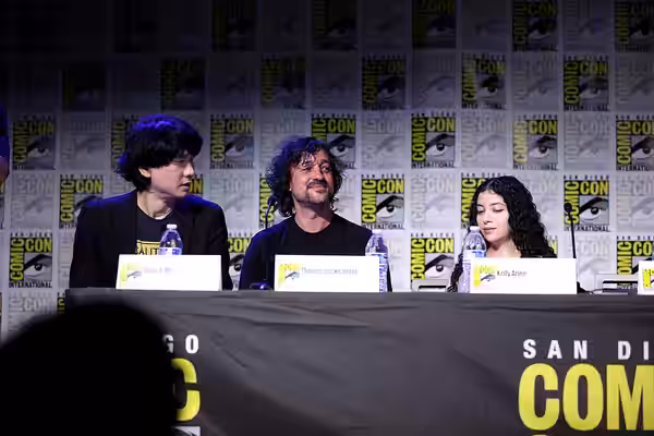 Brian A. Metcalf, Thomas Ian Nicholas and Kelly Arjen speaking at the 2023 San Diego Comic Con International, for "Underdeveloped", at the San Diego Convention 