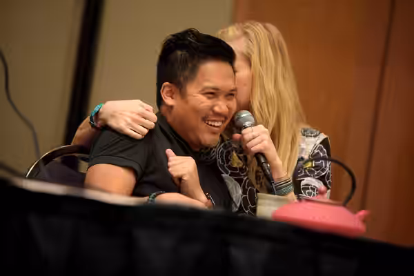 Dante Basco and Janet Varney speaking at the 2014 Comic Media Expo, for "The Legend of Korra" and "Avatar: The Last Airbender", at the Mesa Convention Center in