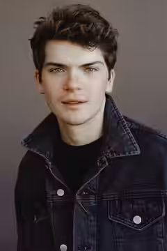 It is a photo of Colton Ryan taken by professional photographer, Travis Chantar (2017)