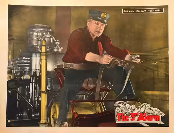 This is a lobby card for the 1922 American silent drama film The Third Alarm.