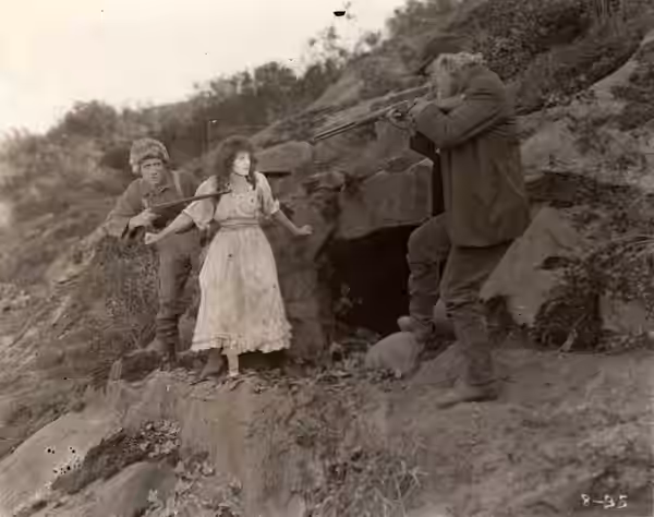 (From left) Unidentified actor, Peggy Hyland, and George Nichols in The Rebellious Bride (1918)
