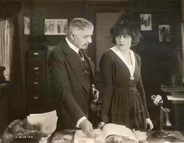 A scene from the American film Marie, Ltd. (1919), which played at the Mission Theater, Seattle. Includes Alice Brady. Date stamped Aug. 13, 1919. Subjects: mot
