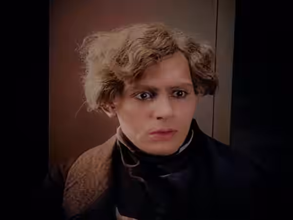 Thomas Hutter as he uncomfortably sits across the table from Count Orlock. (2022)