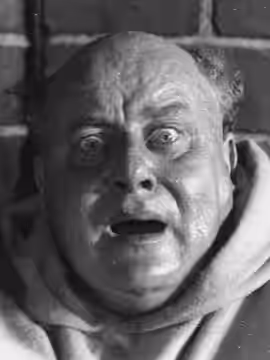 Oscar Stribolt as the fat monk in the 1922 film Häxan. The film is now in the public domain.