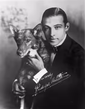 Publicity photograph of Rudolph Valentino and his dog. Actor Rudolph Valentino appeared in many films, including Moran of the Lady Letty (1921), which was filme