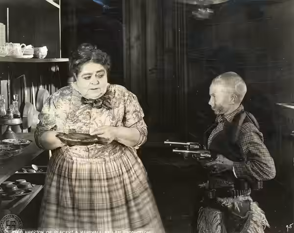 A scene from "Bob Hampton of Placer," with Wesley Barry. Subjects: motion pictures, actors (1921)