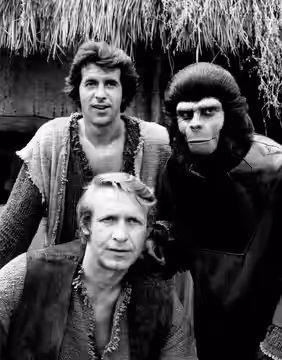 Cast photo from the short-lived television program Planet of the Apes. From left: Ron Harper as astronaut Alan Virdon, Roddy McDowell as Galen, the chimpanzee,  (1974)