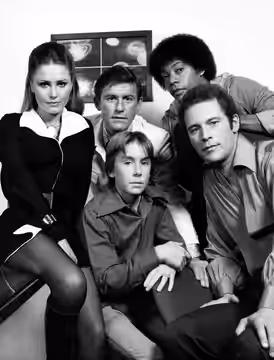 Cast of the very short-lived science fiction program The Fantastic Journey. Back row, L-R: Katie Saylor, Roddy McDowall and Carl Franklin. Front: Ike Eisenmann  (1977)