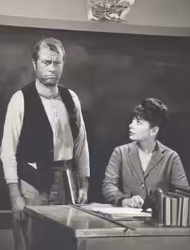 PUPIL. When Ernest T. Bass (Howard Morris) turns up in Mayberry seeking a quick education, schoolteacher Helen Crump (Aneta Corsaut) is persuaded to let him enr (1964)