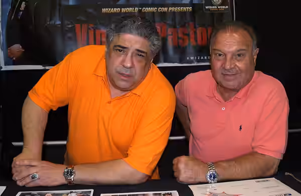 American actor Vincent Pastore (left) and his manager, Stormy Avallone, at the 2013 Wizard World New York Experience Comic Con, at Pier 36 in Manhattan, June 30