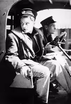 Promotional photograph of James Cagney and Edward Woods in the film The Public Enemy (1937)